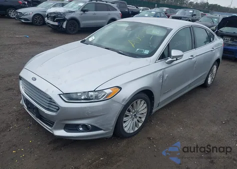 2013 Ford Fusion Hybrid Se z USA, uszkodzony, nr VIN 3FA6P0LU5DR231346